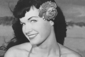 BETTIE, mid 20s. Don't let her all-American looks fool you. Trouble goes out of its way to avoid HER.