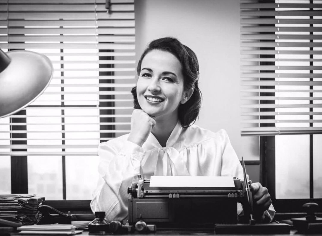 smiling secretary